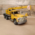 Retro kraanwagen geel